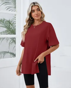 Close-up of a women's burgundy T-shirt featuring a relaxed fit and high side slits