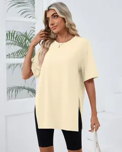 Women's oversized pale yellow short sleeve T-shirt with side slits and crew neck