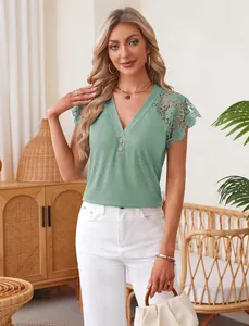 Close-up of sage green V-neck top with elegant lace crochet shoulder details