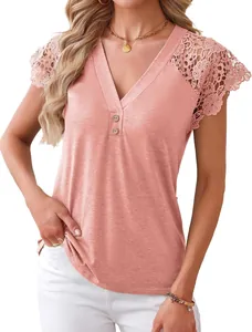 Close-up of pink V-neck top featuring intricate lace crochet detailing on the shoulders.