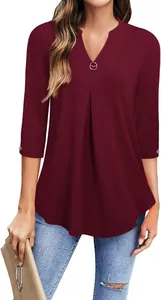Close-up detail of women's burgundy 3/4 sleeve V-neck blouse with front pleat