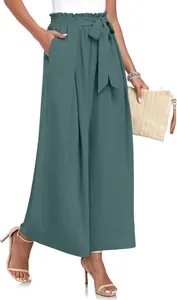 Vue professionnelle du pantalon large plissé bleu sarcelle avec ceinture à nœud