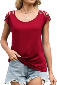 Detail view of women's red knit top highlighting the ladder cutout shoulder design and texture