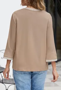 Back view of a khaki round neck knit top featuring stylish striped ribbed trim details.