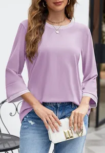 Detail showing striped rib knit collar and cuffs of a casual lavender long sleeve top