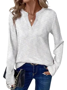 Elegante witte dames top met wafelstructuur lange mouwen en V-hals in casual stijl