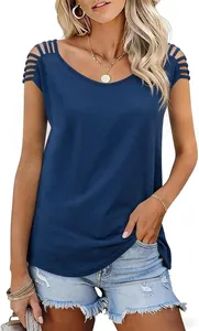 Detailed close-up of navy blue summer knit top with unique hollow-out shoulder straps