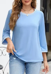 Light blue long sleeve knit top with striped ribbed crew neck and cuffs detail.