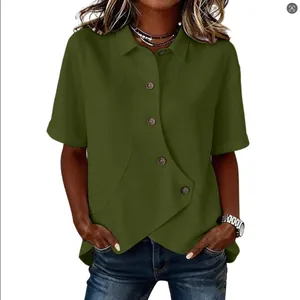 Close-up of olive green casual shirt with unique irregular hem and button detail