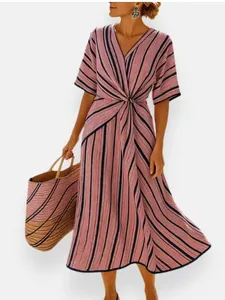 Elegant women's V-neck pink and black striped midi dress with stylish waist knot detail