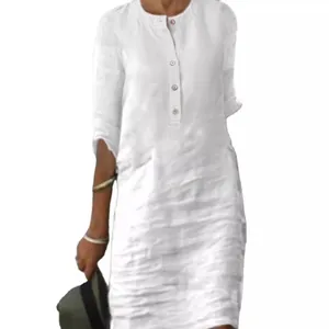 Elegante vestido midi holgado de algodón y lino blanco con cuello redondo y mangas