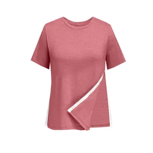 Detail showing side snap button adjustment on a pink casual crew neck T-shirt