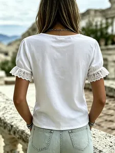 Back view of a chic white summer top featuring elegant puff lace sleeves and round neck