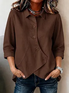Bruine damesblouse met asymmetrische zoom en driekwart mouwen