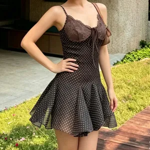 Elegant sexy brown polka dot mini dress with lace trim and bow detail for summer