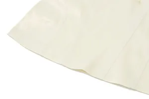 Detailed view of the hemline and fine stitching on a cream French style satin vest top