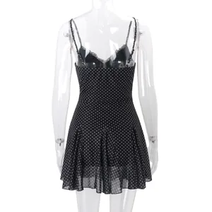Back view of sexy black polka dot sheer dress with delicate lace trim and straps