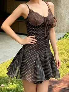 Chic brown polka dot camisole dress featuring sexy lace trim and flared skirt for summer