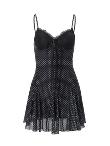 Elegant black polka dot mini dress featuring lace trim and front tie detail for summer