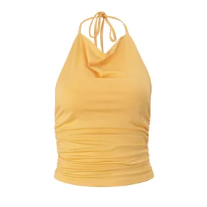 Close-up detail showing the elegant cowl neck and side ruching on yellow halter top