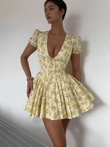 French vintage floral mini dress with deep V-neck and puff sleeves for summer.
