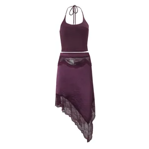 Completo estivo con top all'americana viola intenso e gonna asimmetrica con pizzo