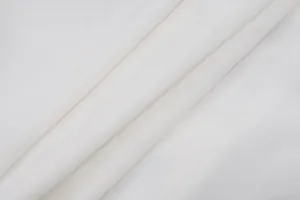 Vista macro ravvicinata del tessuto bianco traspirante di alta qualità per top