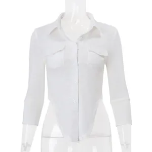 Slim fit white lapel button-down shirt with unique curved hem detail on torso mannequin