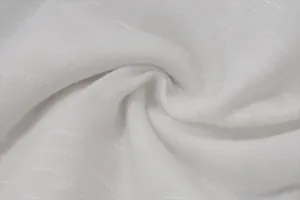 Close-up detail of the white breathable knit fabric showing soft texture and fine weave