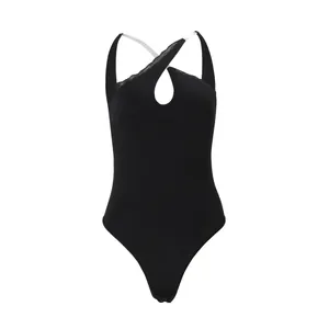 Detailed view of black slim fit bodysuit with cross halter neck and elegant lace trim