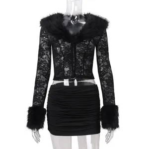 Detail view of black lace long sleeve top with fur trim and matching ruched mini skirt set