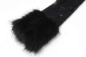 Detailed view of the elegant black lace sleeve with plush faux fur trim detail