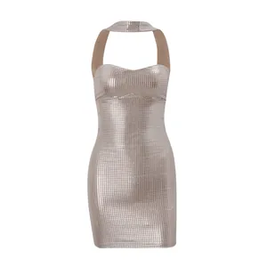 Macro view of the shiny silver sequin texture on this sexy halter neck bodycon mini dress