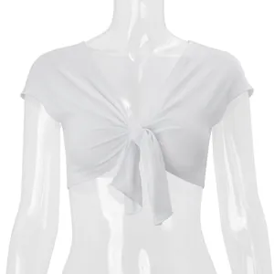 Close-up of white short-sleeve cropped shrug blouse with a stylish front tie knot