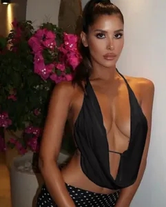 Close-up of sexy black V-neck halter top with deep low-cut design for night out