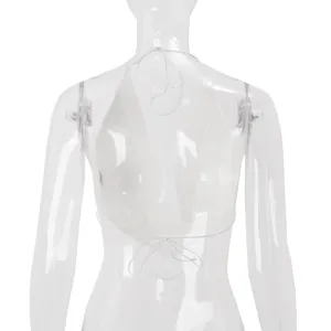 Back view detail of sexy white halter neck crop top with adjustable lace-up ties on mannequin