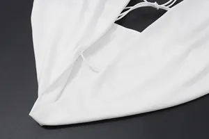 Close-up detail of white elastic fabric for a sexy halter neck top vest for women.
