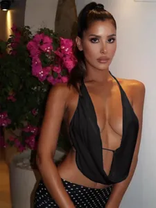 Sexy black halter top with deep V-neck and open back for summer night out