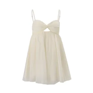 Detailed front view of a cream chiffon camisole top with twisted bust and cutout design