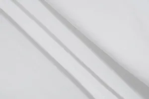 Vista macro detallada de la textura de la tela blanca de alta calidad y costuras limpias