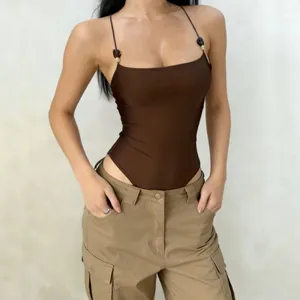 Front view of a sexy brown sleeveless bodysuit with thin straps and a slim-fit design.