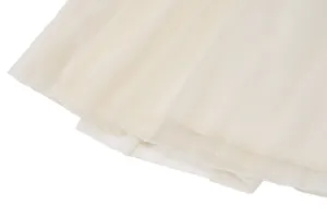 High-quality close-up detail showing the pleated chiffon hem of a summer camisole