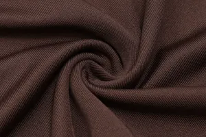 Detail macro shot of high-quality brown ribbed knit fabric for women's summer jumpsuit