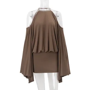 Detail view of brown off-shoulder dress with draped batwing sleeves and bodycon fit
