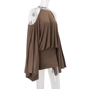 Detailed side view of a sexy backless brown mini dress with irregular batwing sleeves