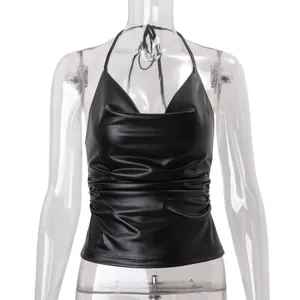 Detailed macro view showing the ruched texture on a black PU leather halter camisole top.