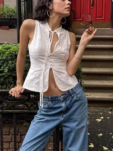 Sexy white eyelet sleeveless tie-front crop top in a fashionable streetwear style
