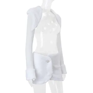 Detailed view of white faux fur bolero shrug and matching bodycon mini skirt set