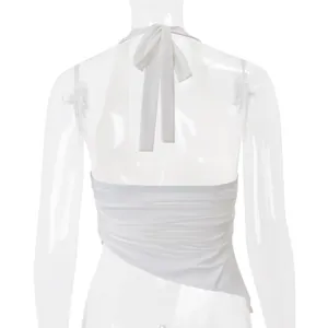 Close-up back view of a white halter neck backless top featuring an irregular hemline