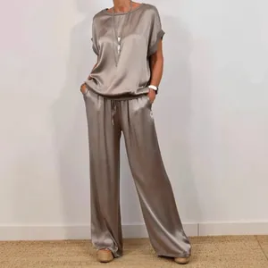 Elegant two-piece satin set featuring loose short-sleeve top and wide-leg trousers
